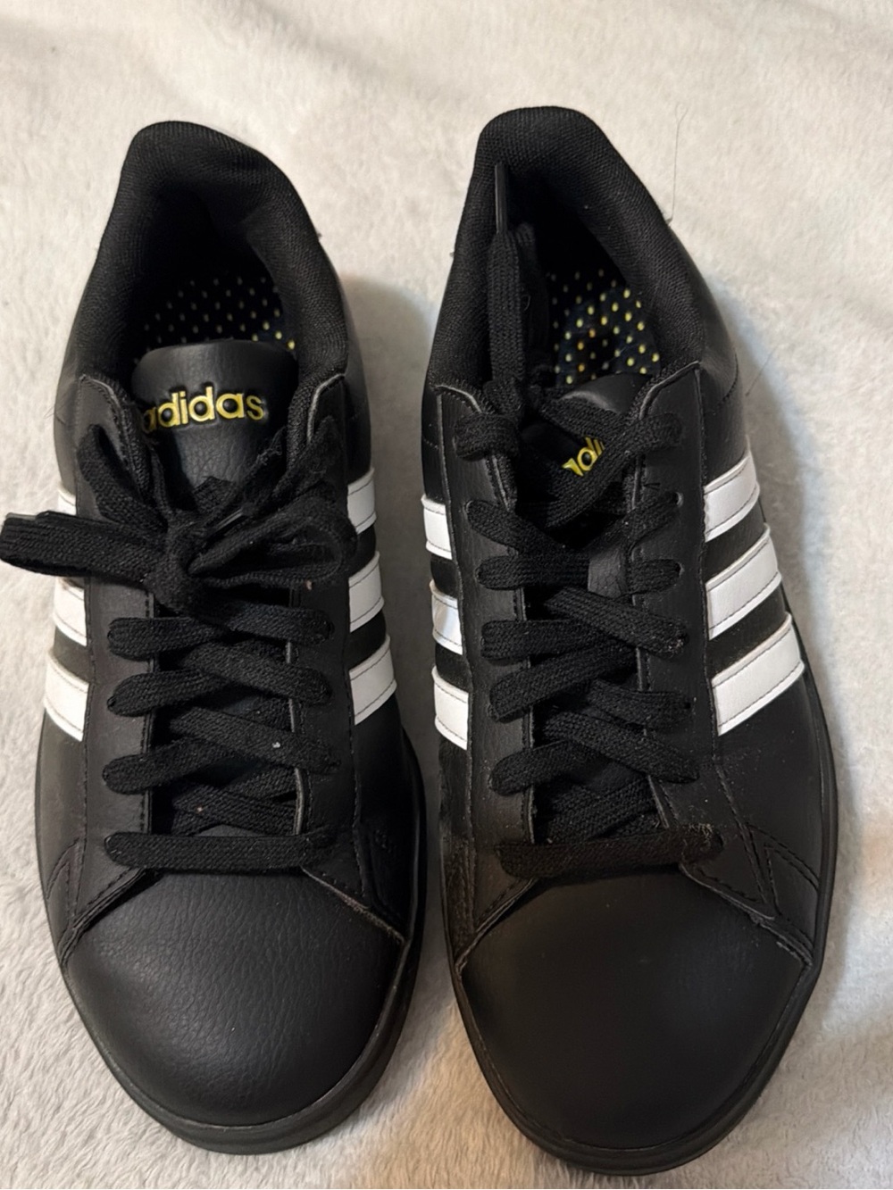 adidas Black Sneakers with White Stripes and Gold Logo
